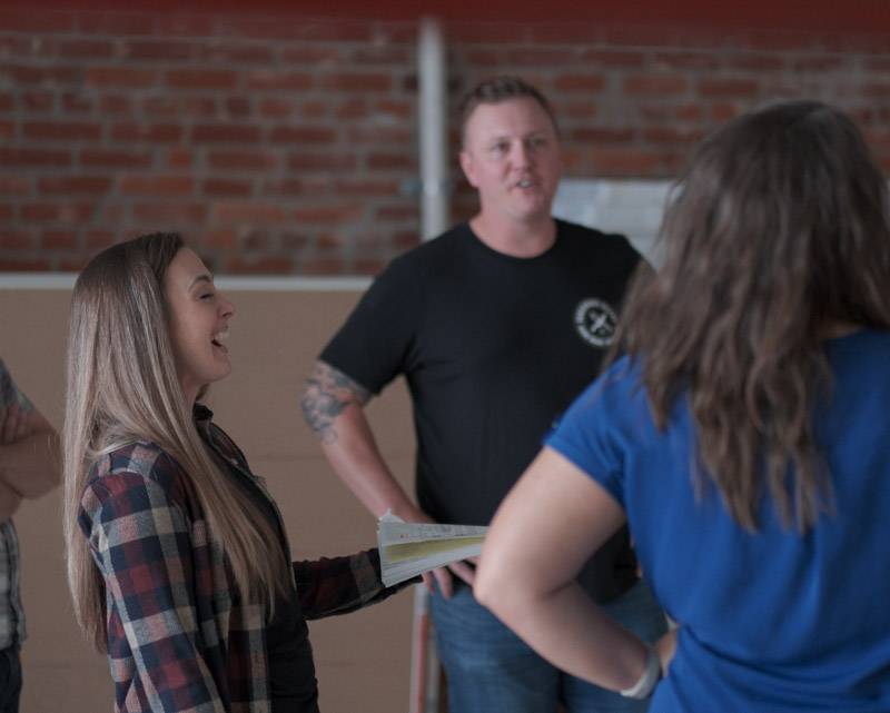 Seasoning bistro owners Katie and Troy talking with interior designers for their new Marion location