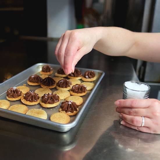 Adding finishing touches to iced shortbread